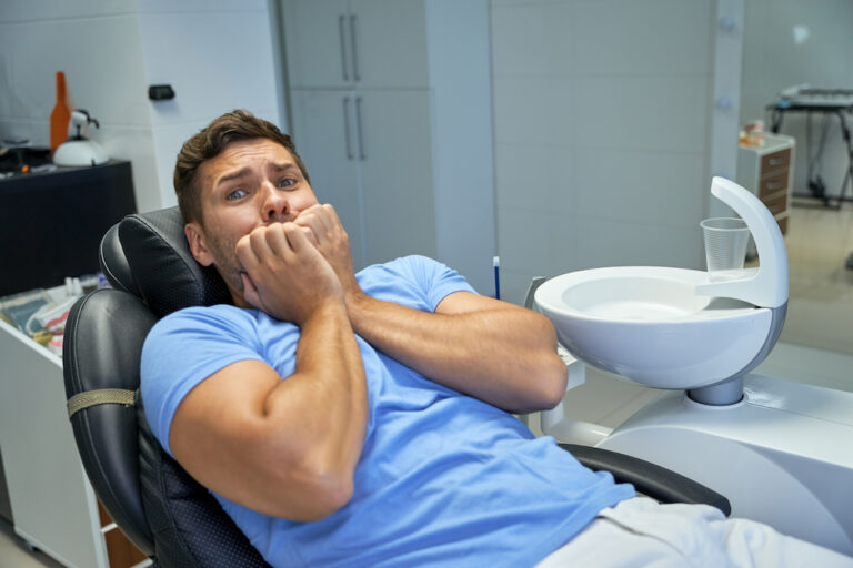 scared male patient anticipating a dental check up 2022 09 26 16 48 28 utc 1